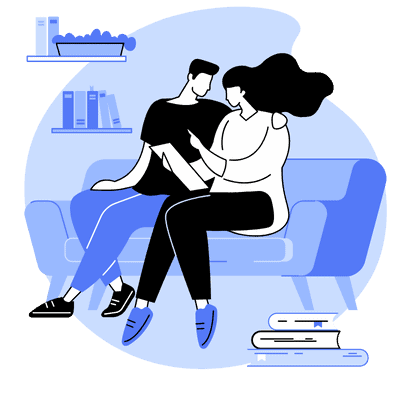 man and woman cuddling on couch together