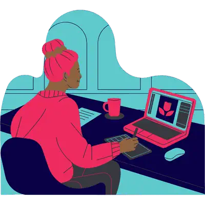 woman sitting at computer taking notes