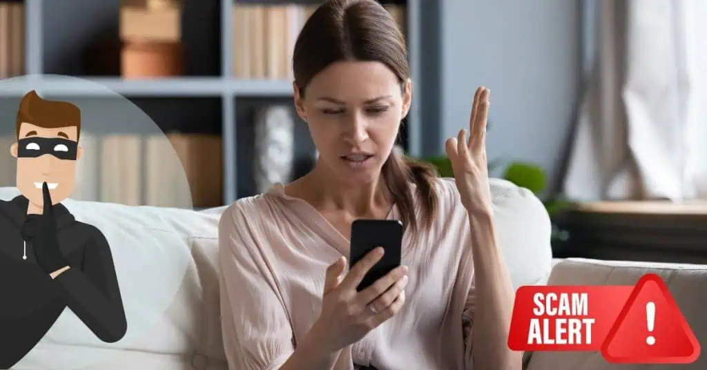 woman looking at phone concerned with scam alert